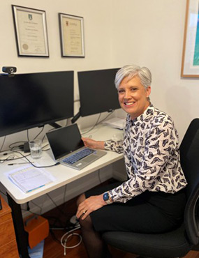 Professor Sheedy at computer desk