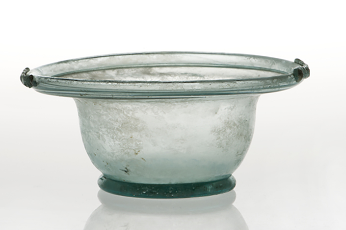 Small blown Roman bowl or acetabulum (for vinegar) with rim decorations in blue-green glass