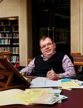 Adam Johnston researching his thesis photo credit State Library of NSW