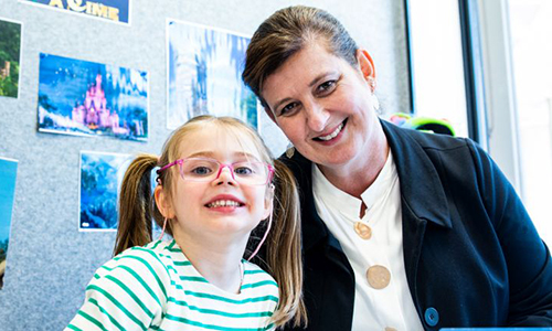 Stephanie McConnell with a young student