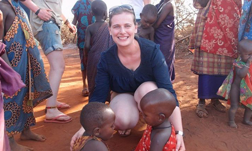 Susanna Matters in a photo with two young children